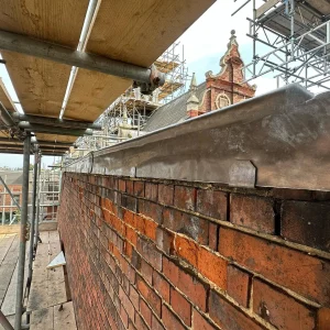 leadwork-lead-saddle-installation-roof-charterhouse-school
